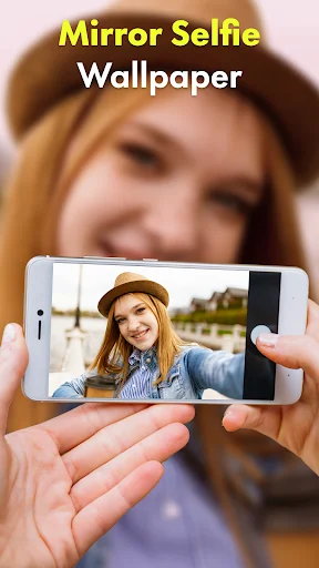 Mirror selfie wallpaper feature showing front-facing camera view. Young woman in hat taking selfie with phone displaying live camera wallpaper personalization.